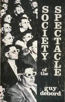 Cover of the book 'The Society of the Spectacle' by Guy Debord, featuring a crowd wearing 3D glasses Cover of the book 'The Society of the Spectacle' by Guy Debord, featuring a crowd wearing 3D glasses